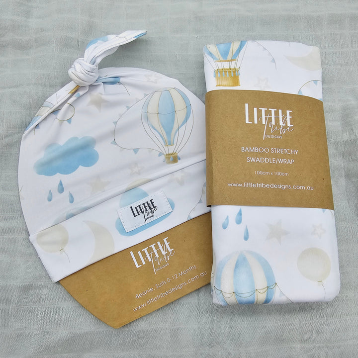 Bamboo Baby Swaddle And Beanie Set In The Air