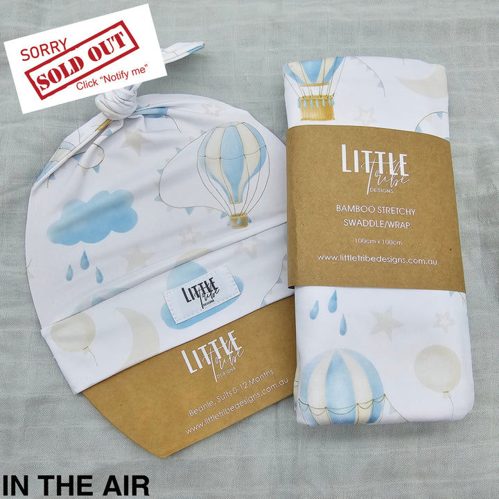 Bamboo Baby Swaddle And Beanie Set In The Air