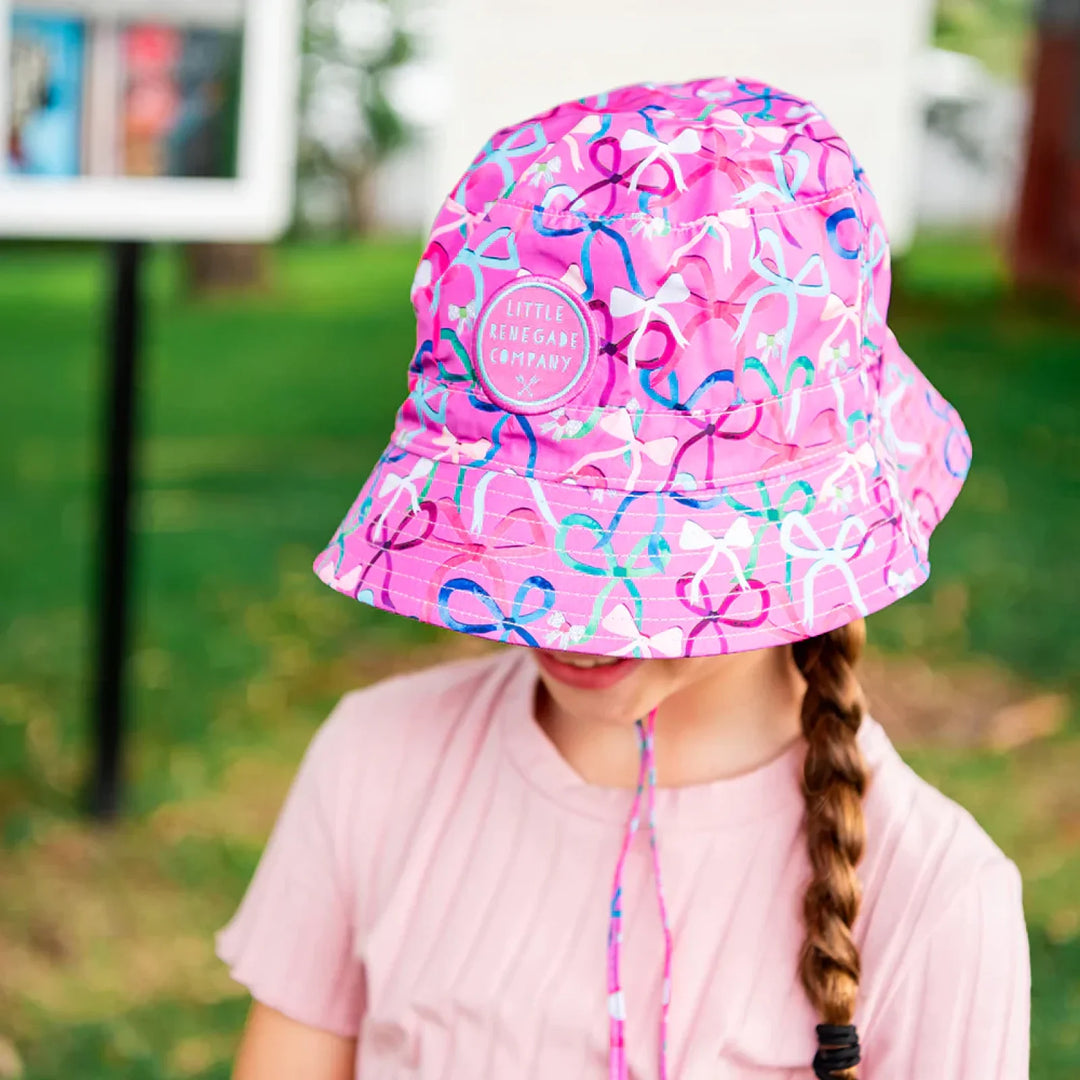 Little Renegade Company Reversible Bucket Hat - Lovely Bows/Purple