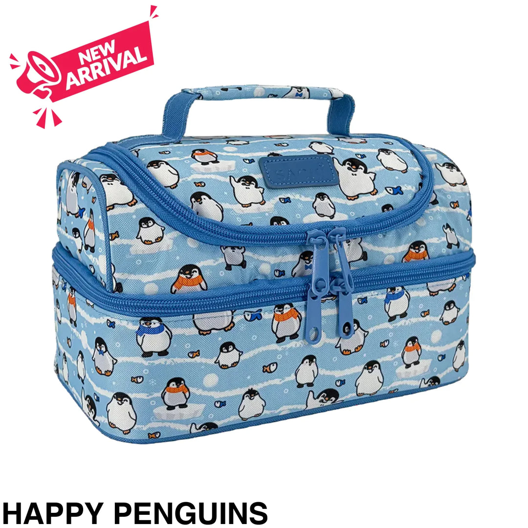 A light blue insulated lunch bag with a repeating penguin print, featuring blue zippers, a top handle, and a small black-and-white logo patch on the front.